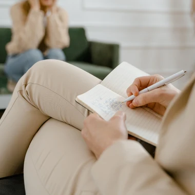 inidvidual counselling Woman writing in a journal during an individual counselling session